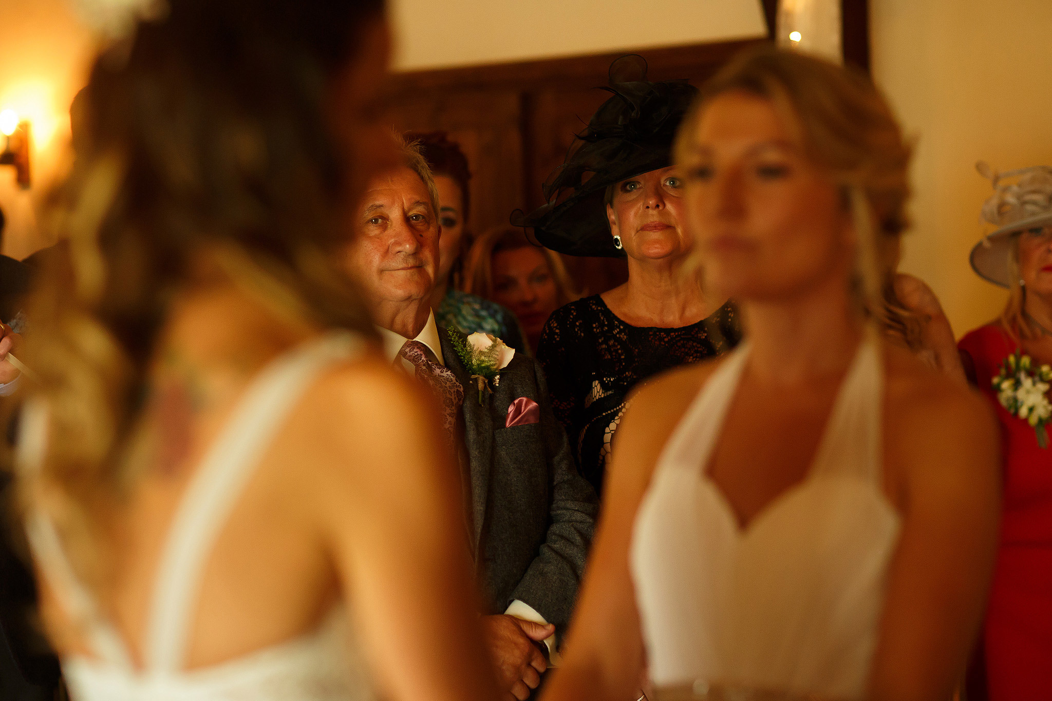 Family watching their daughter marry - great hall at mains wedding photography