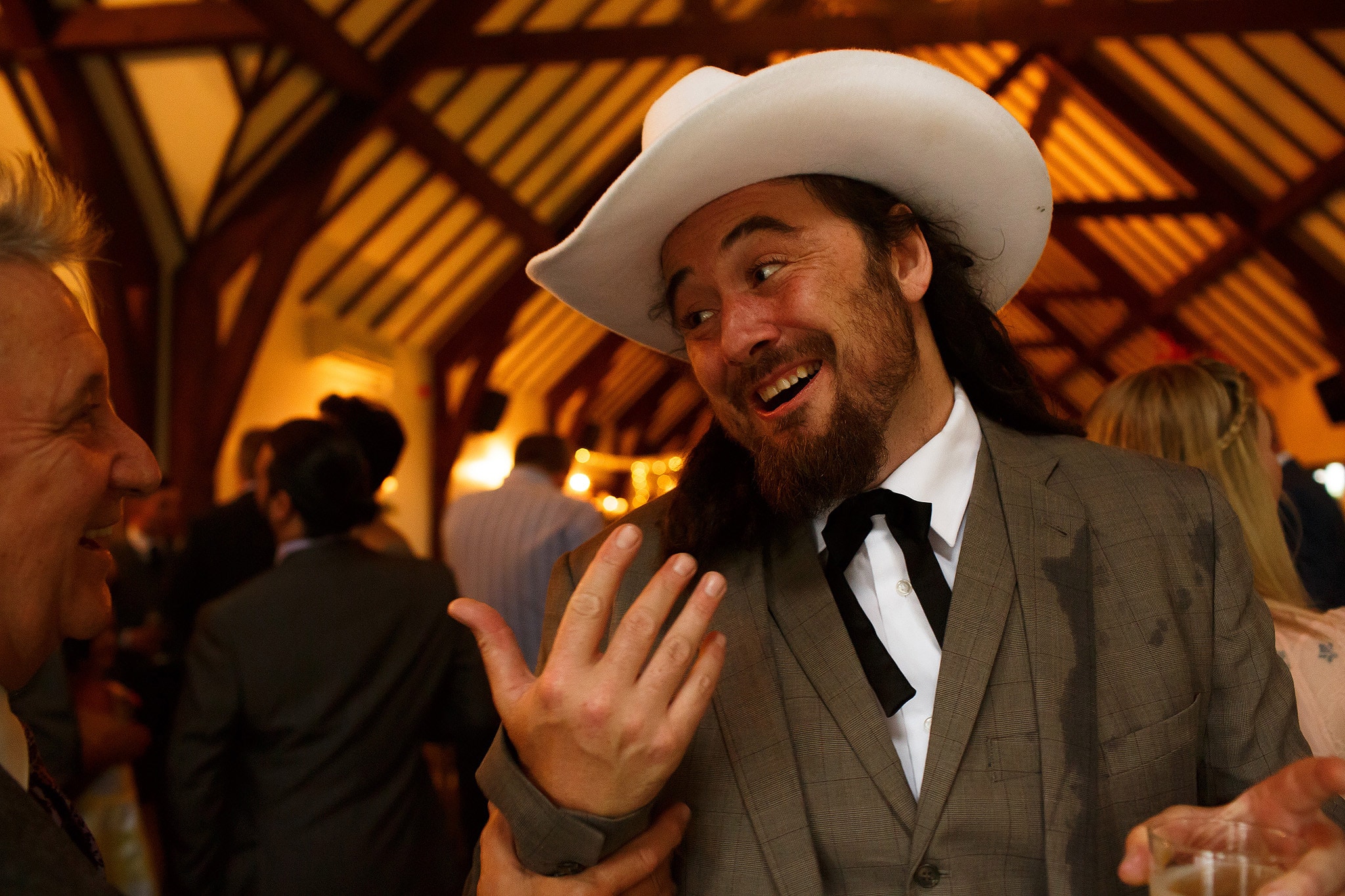 Wedding guest enjoying the wedding reception at the Great Hall at Mains 