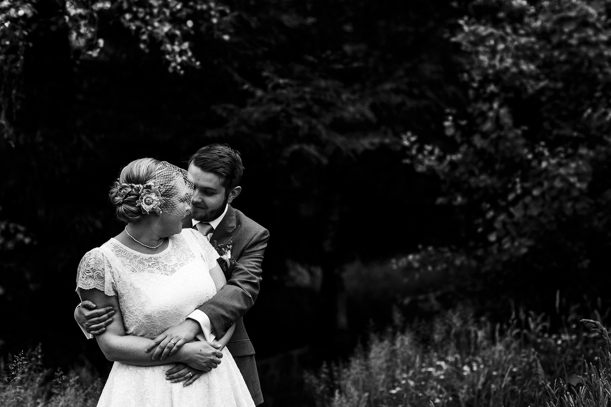 Bride and groom portraits in the countryside at the Oak Tree at Peover wedding