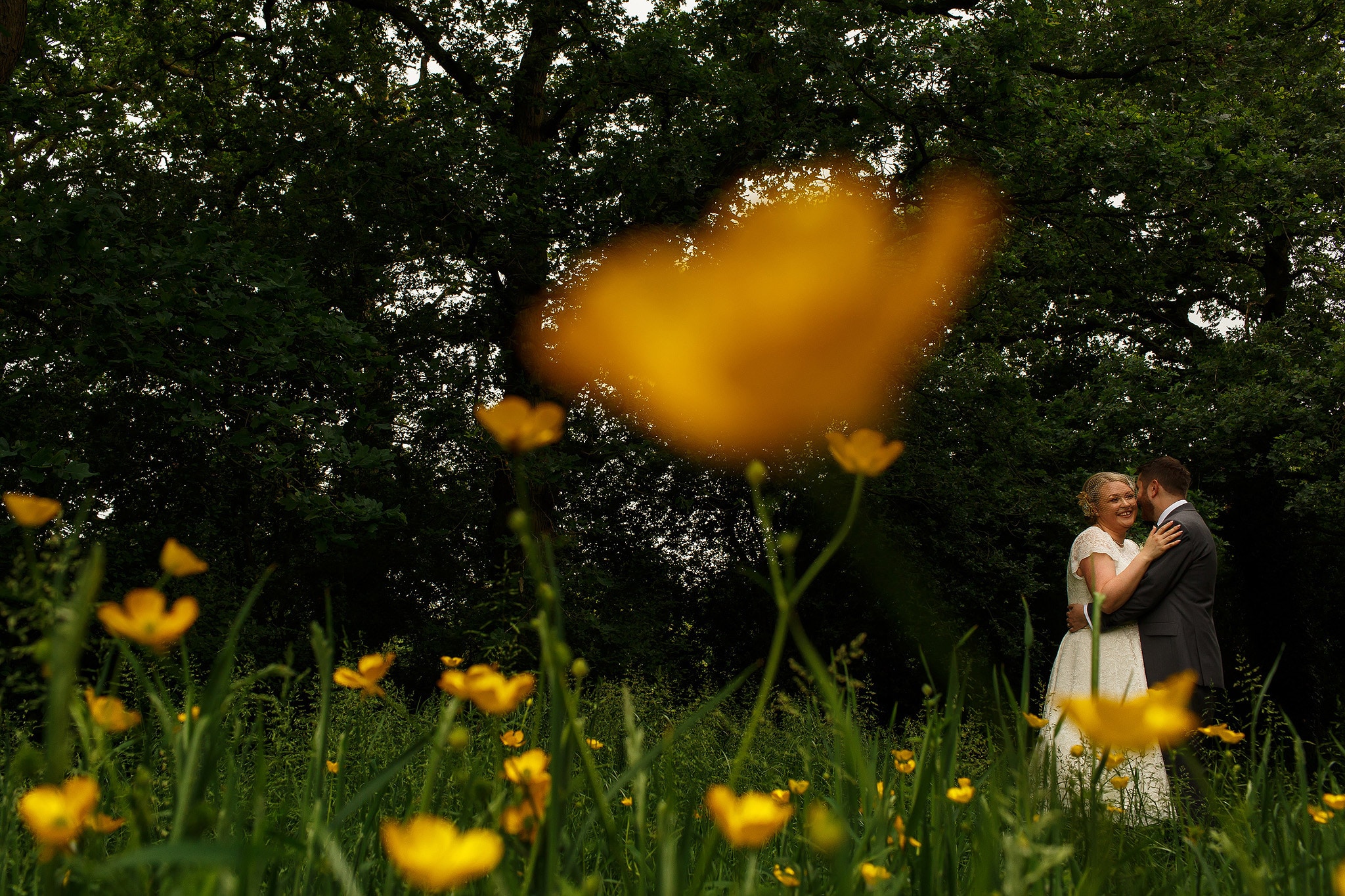 Bride and groom portraits in the countryside at the Oak Tree at Peover wedding