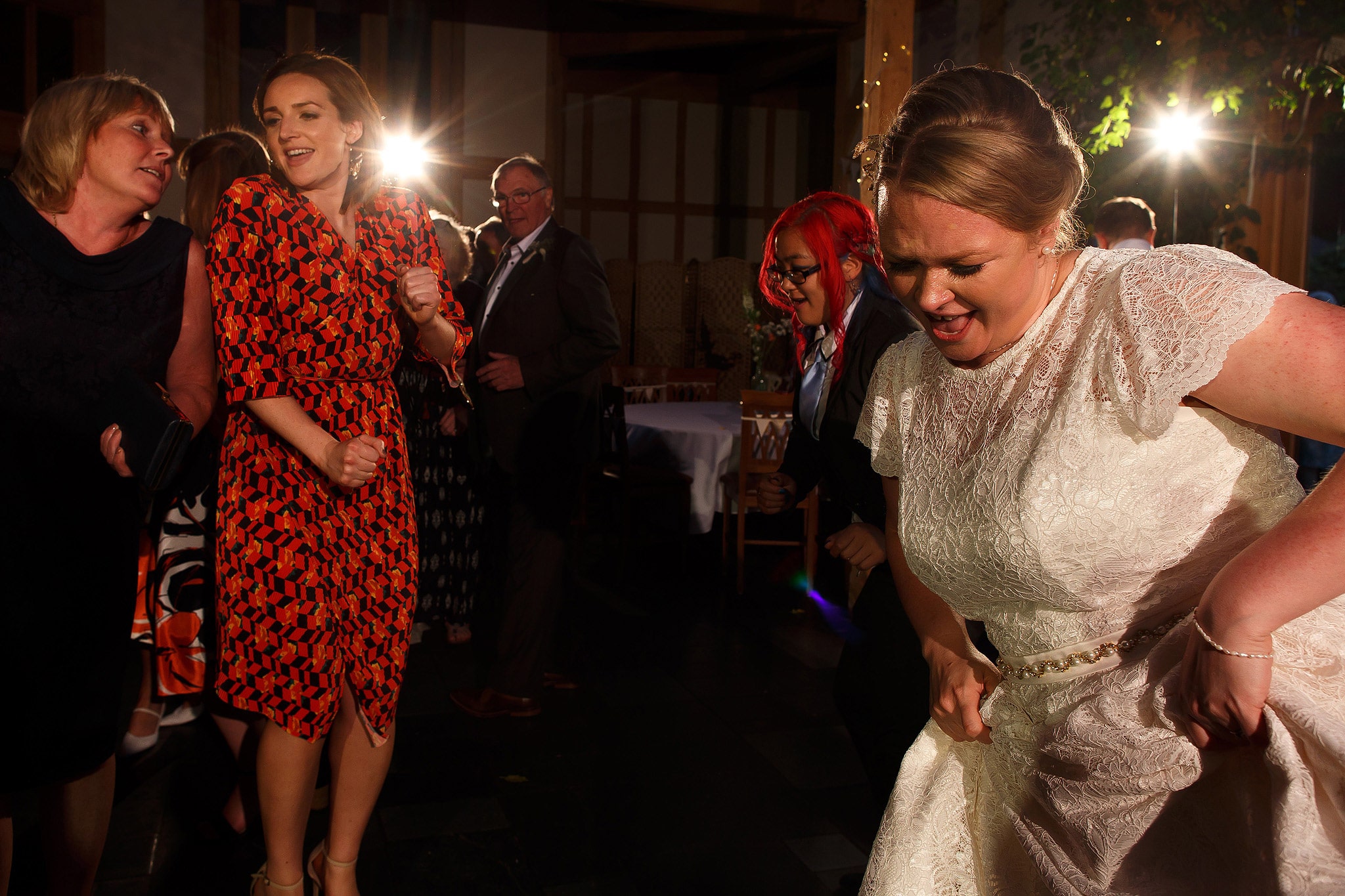 Wedding guests dancing during wedding reception at the Oak Tree at Peover