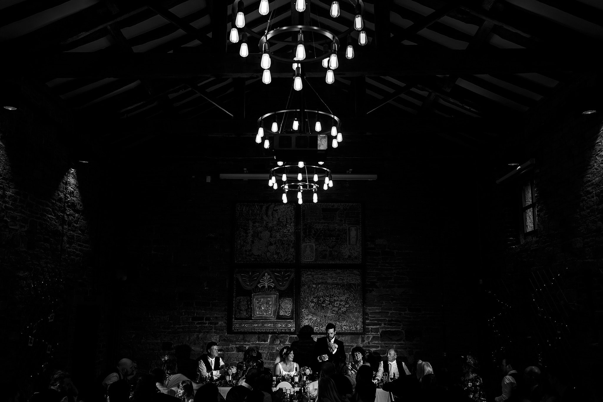 Oakwell Hall Barn wedding speeches with banqueting layout of tables