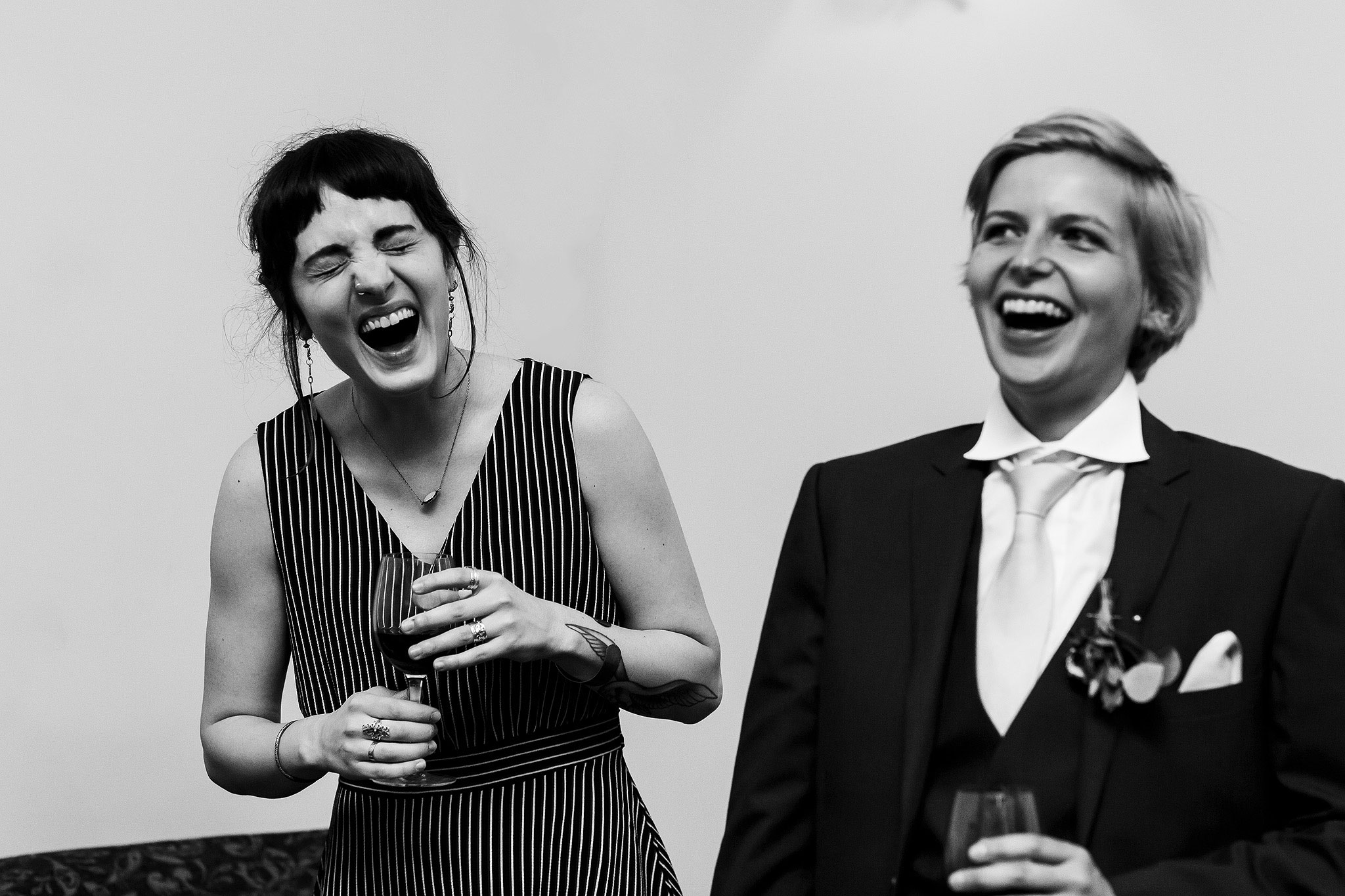 Wedding guests laughing during speeches - The Villa at Wrea Green Wedding Photography - Toni Darcy Photography