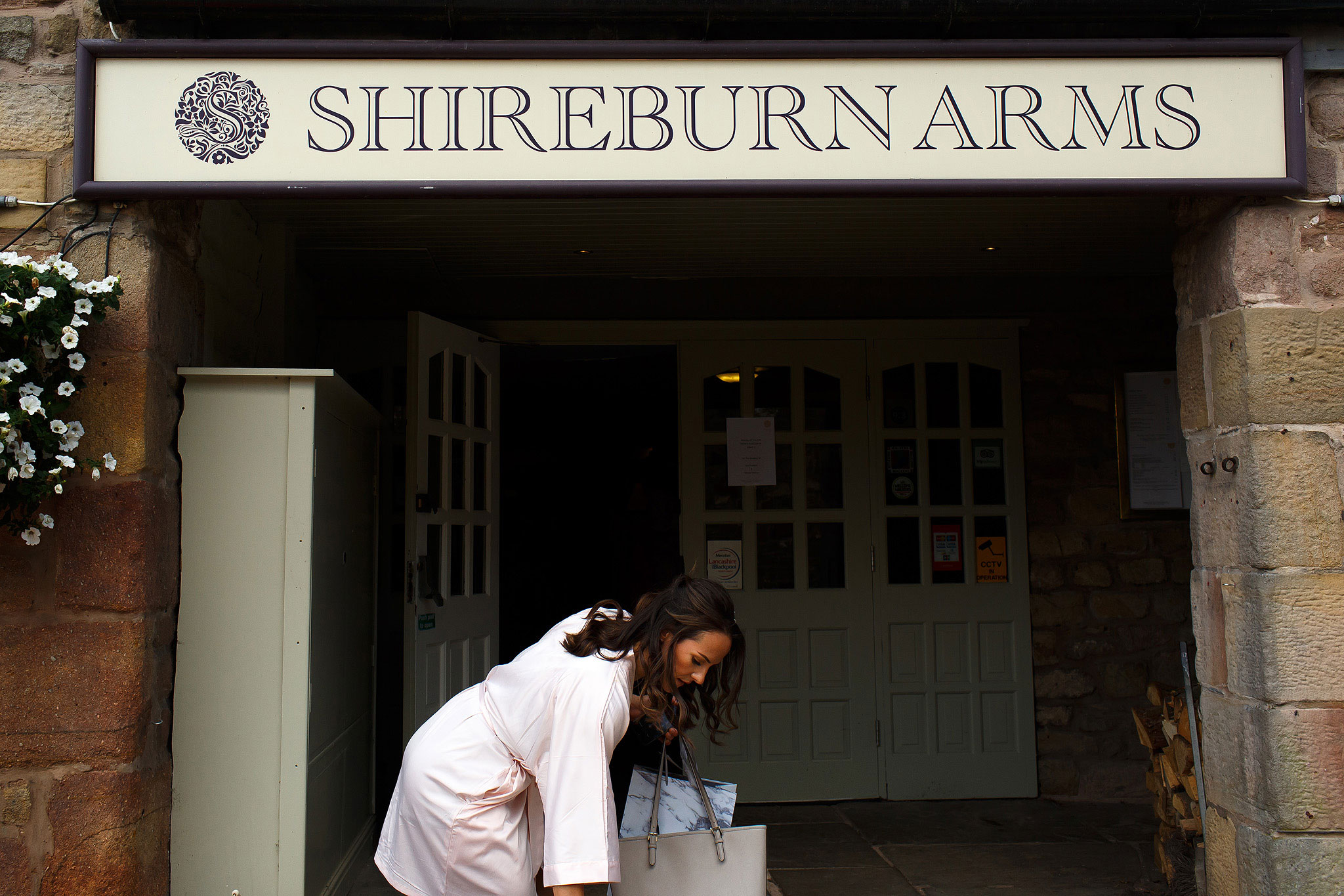 Bride arriving at Shireburn Arms wedding venue 