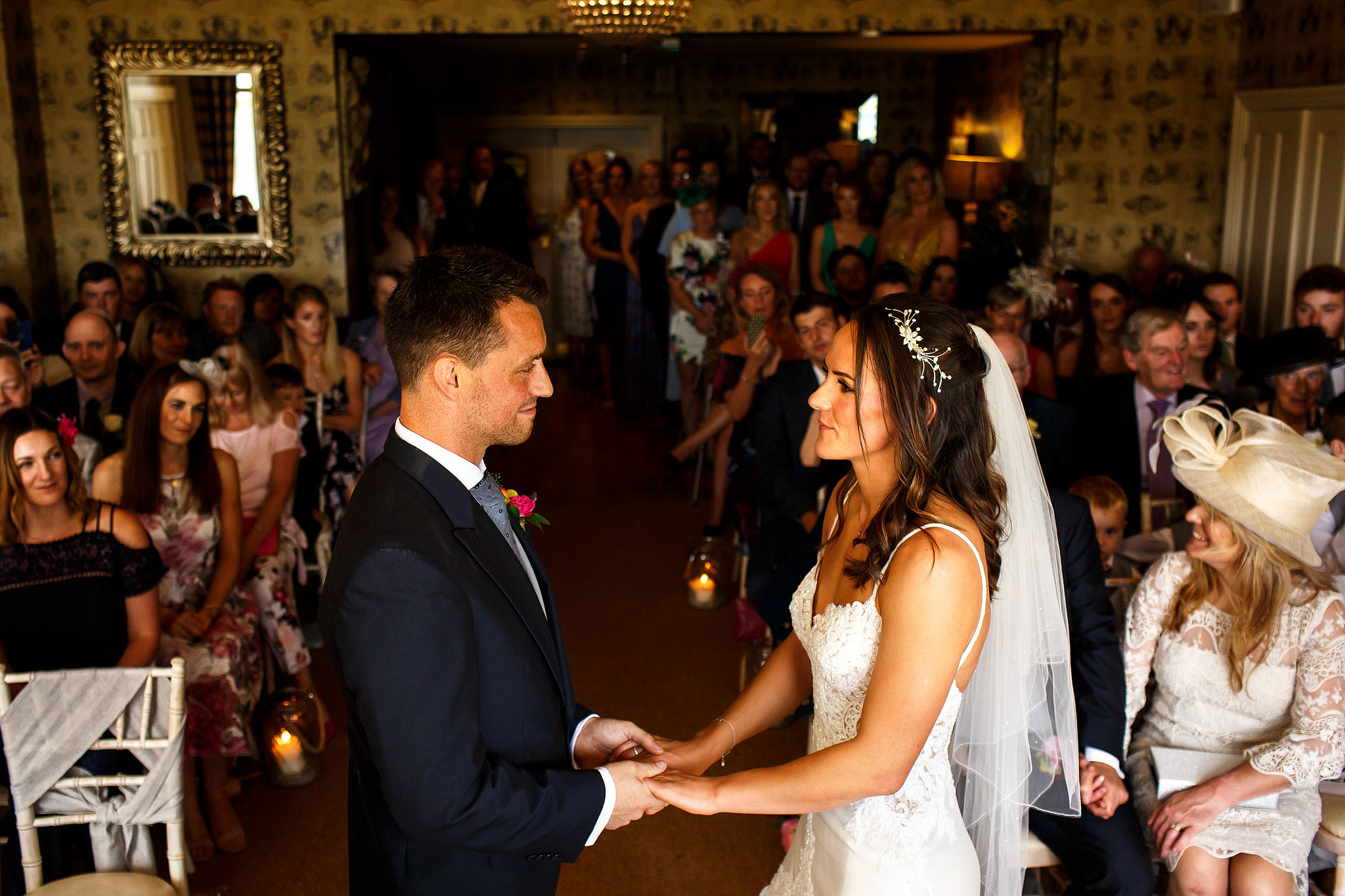 Bride and Groom and all wedding guests during civil ceremony at the Shireburn Arms