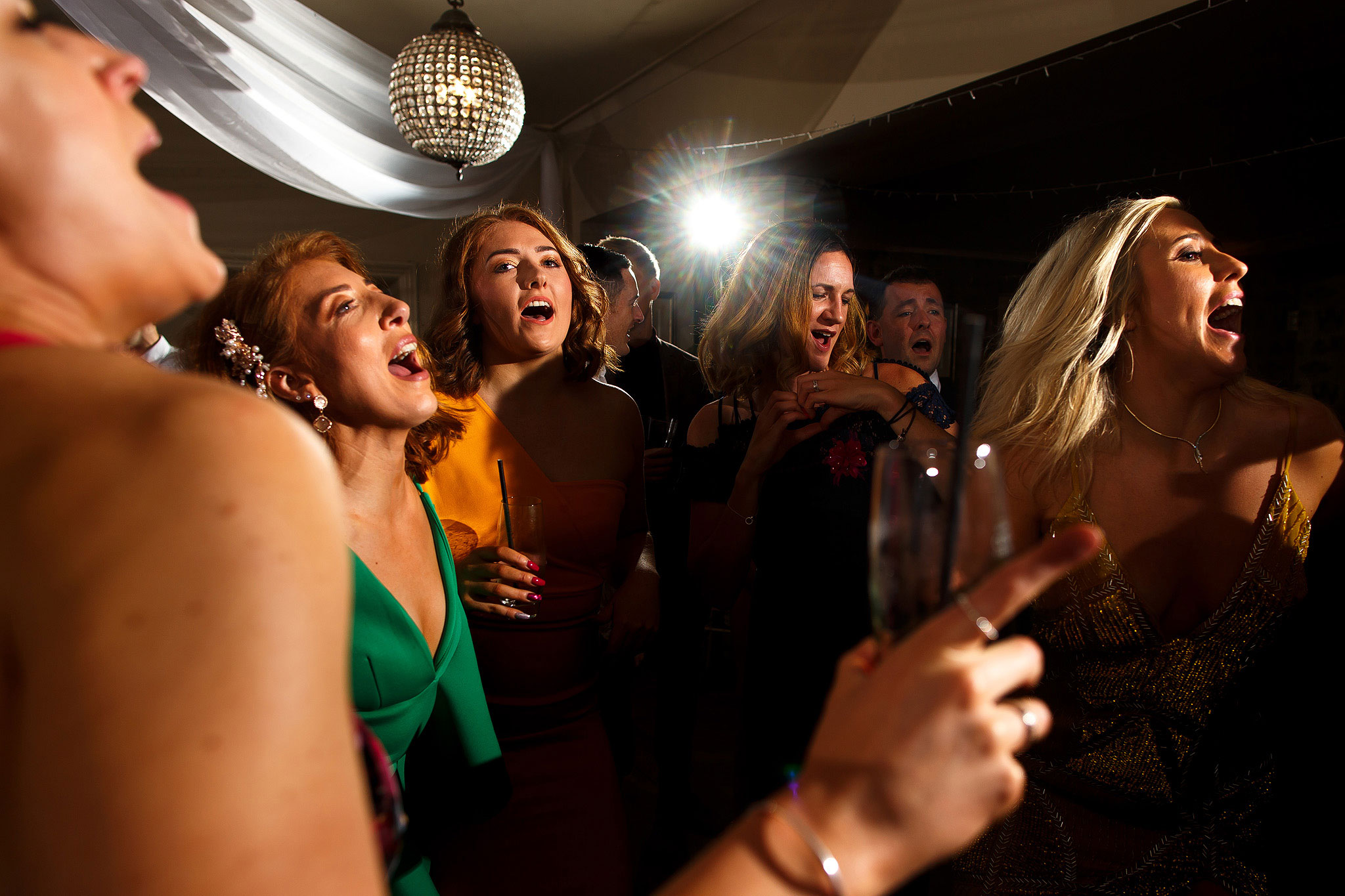Guests on the dance floor during evening wedding reception at the Shireburn Arms