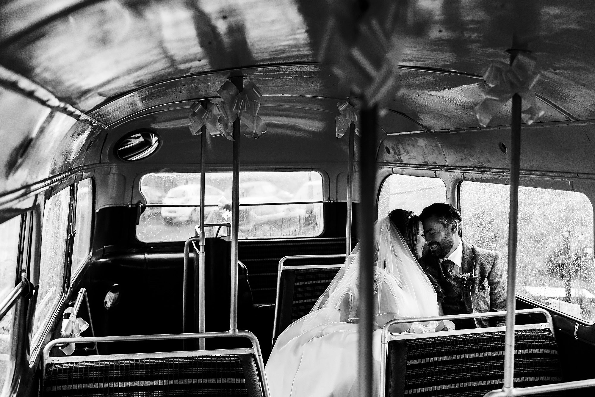 Bride and Groom enjoying a private moment on the wedding bus at the wellbeing farm | Wellbeing Farm wedding photographs by Toni Darcy Photography