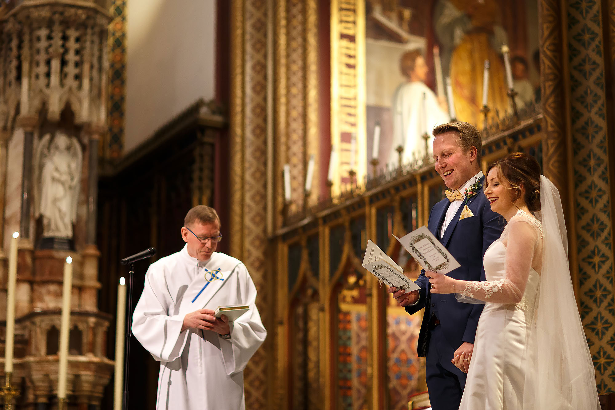 Bride and Groom stood on the altar at St Peters Stonyhurst | Mitton Hall wedding photographs by Toni Darcy Photography