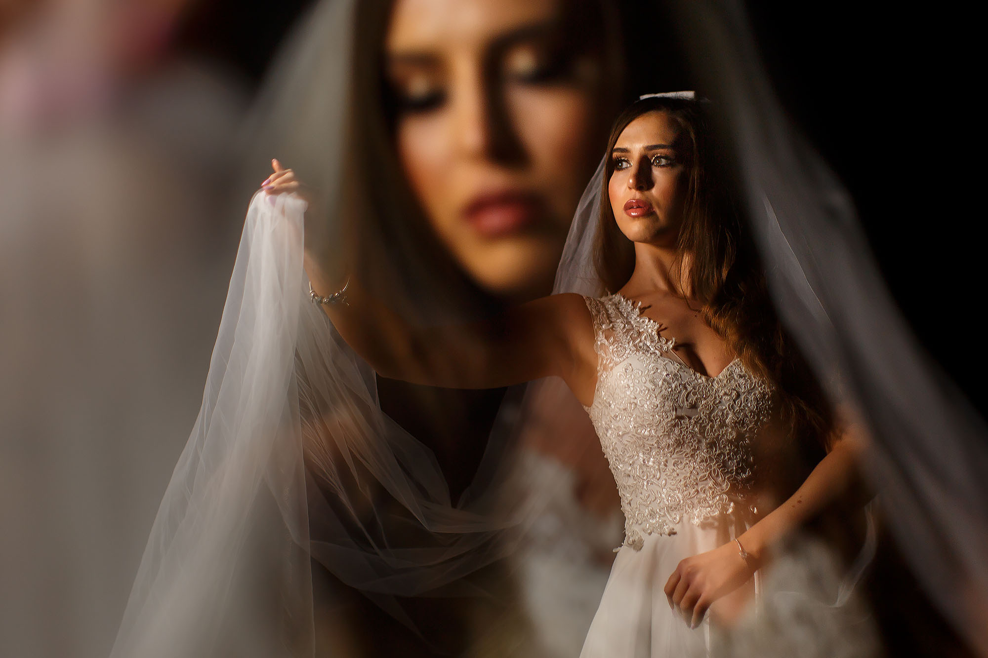 Bride walking across the sand dunes in gold sequin dress